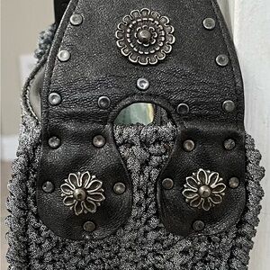 Super Stylish Raffia Carrie Forbes handbag with leather straps. 🤩